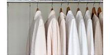 Freshly cleaned garments on rails
